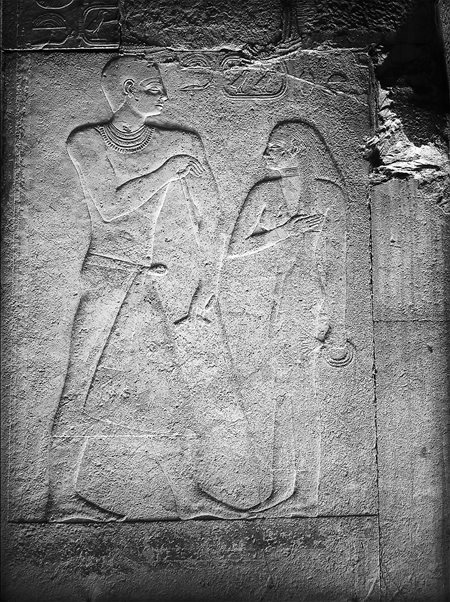 Thanks to Ibrahim’s skillful edge lighting in this August 1929 photo, details are clear in a wall relief in a chapel room of Giza’s Eastern Cemetery. It shows, at left, Khufukahf I, a high priest from the fourth dynasty of the Old Kingdom, 2575-2465 BCE, and one of his queens, right. 