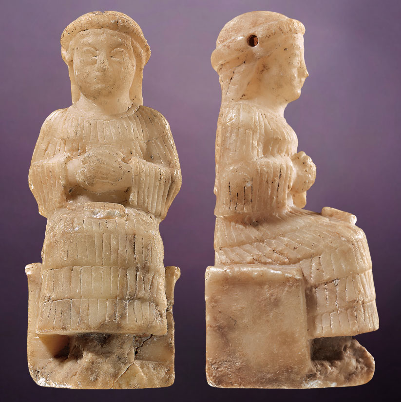 An alabaster statuette, its actual size not much larger than an adult index finger, shows a seated female figure with a tablet on her lap. Dating to some 4,000 years ago, it is thought to represent a high priestess. If a portrayal of Enheduanna were ever discovered, it might well look like this statuette.