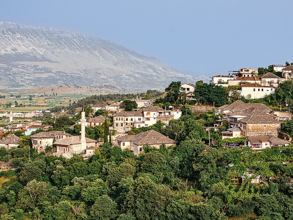 With its ancient stone houses and narrow, winding streets, Gjirokastër, in southern Albania, is often called the “City of Stone.” It’s recognized as a UNESCO World Heritage Site for its unique blend of Ottoman and Albanian architecture and was, at various times, also occupied by Greeks, Romans and Byzantines, with each of these cultures leaving their mark.